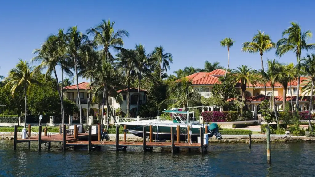 Waterfront homes along a Florida canal with boats docked at private docks