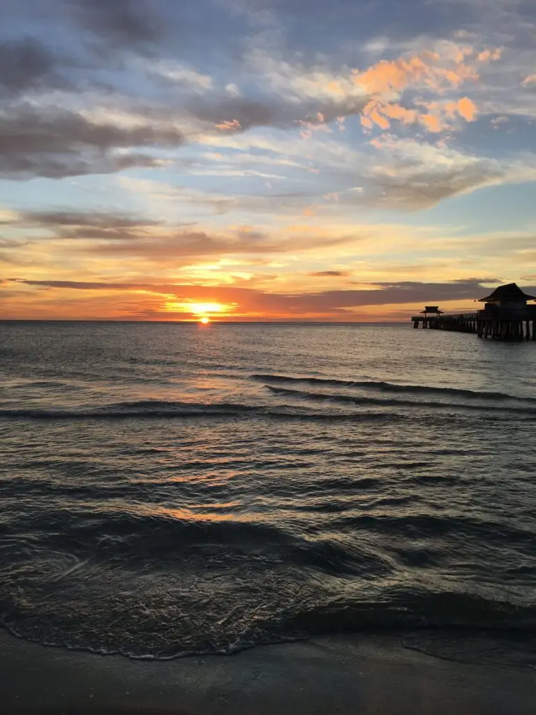 Sunset over the Gulf of Mexico at Naples Pier in Southwest Florida