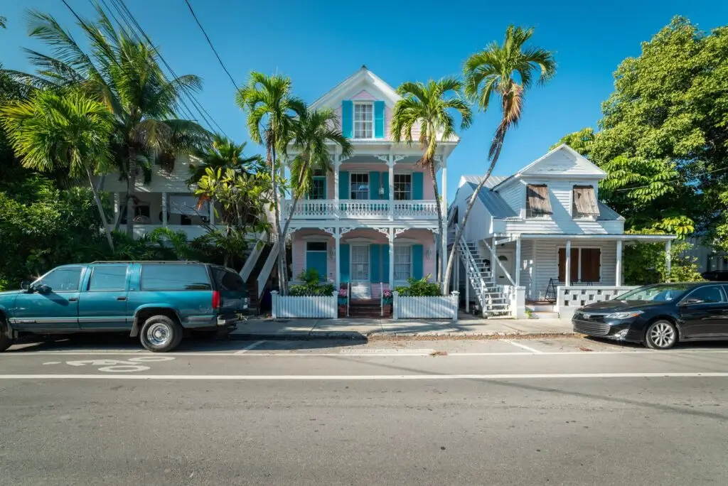 Colorful historic houses lining a sunny street in Key West Florida